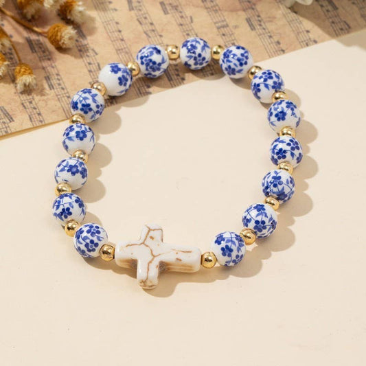 BLUE CERAMIC PORCELAIN CROSS CHARM BRACELET | 40B5175