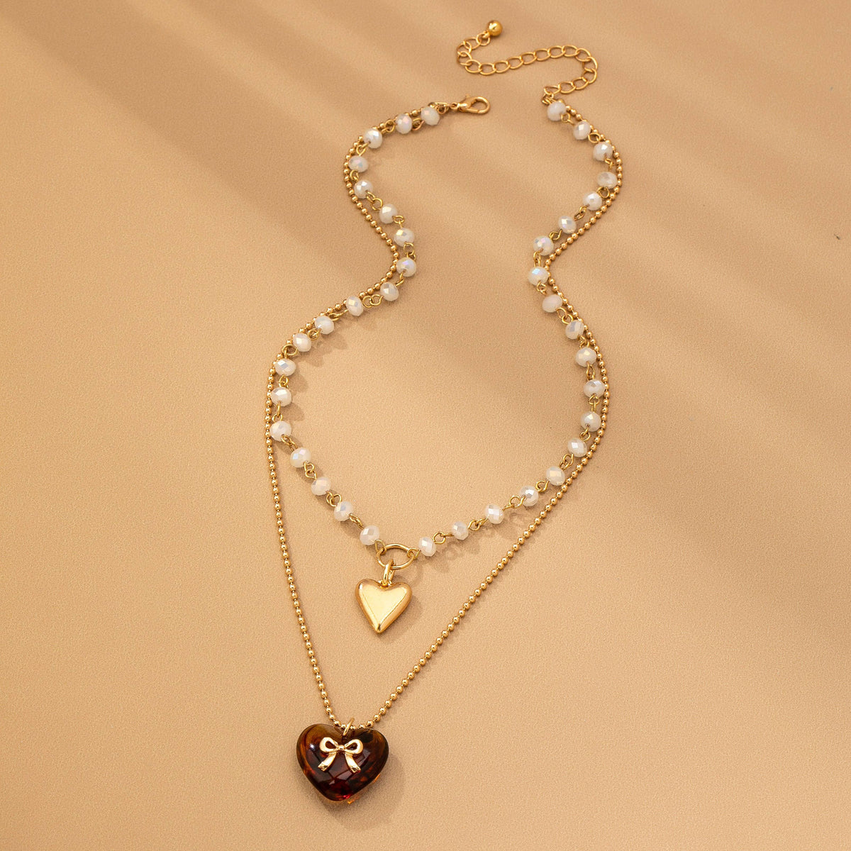 MULTI LAYER DOUBLE HEART CHARM NECKLACE | 80N92656